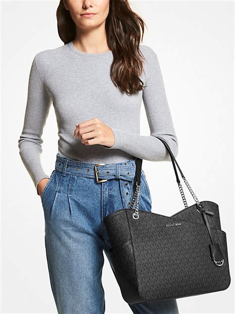 michael kors laptoptassen speciale handvatten jet set|Michael Kors jet set bag.